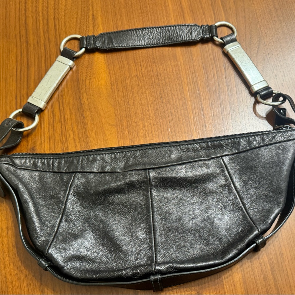 Vintage Yves Saint Laurent 'Mombasa' Leather black pre owned in excellent shape